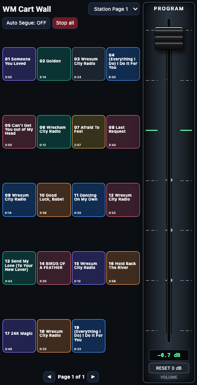 Genuine WM Cart Wall browser remote showing twenty populated carts, playback controls and the programme fader
